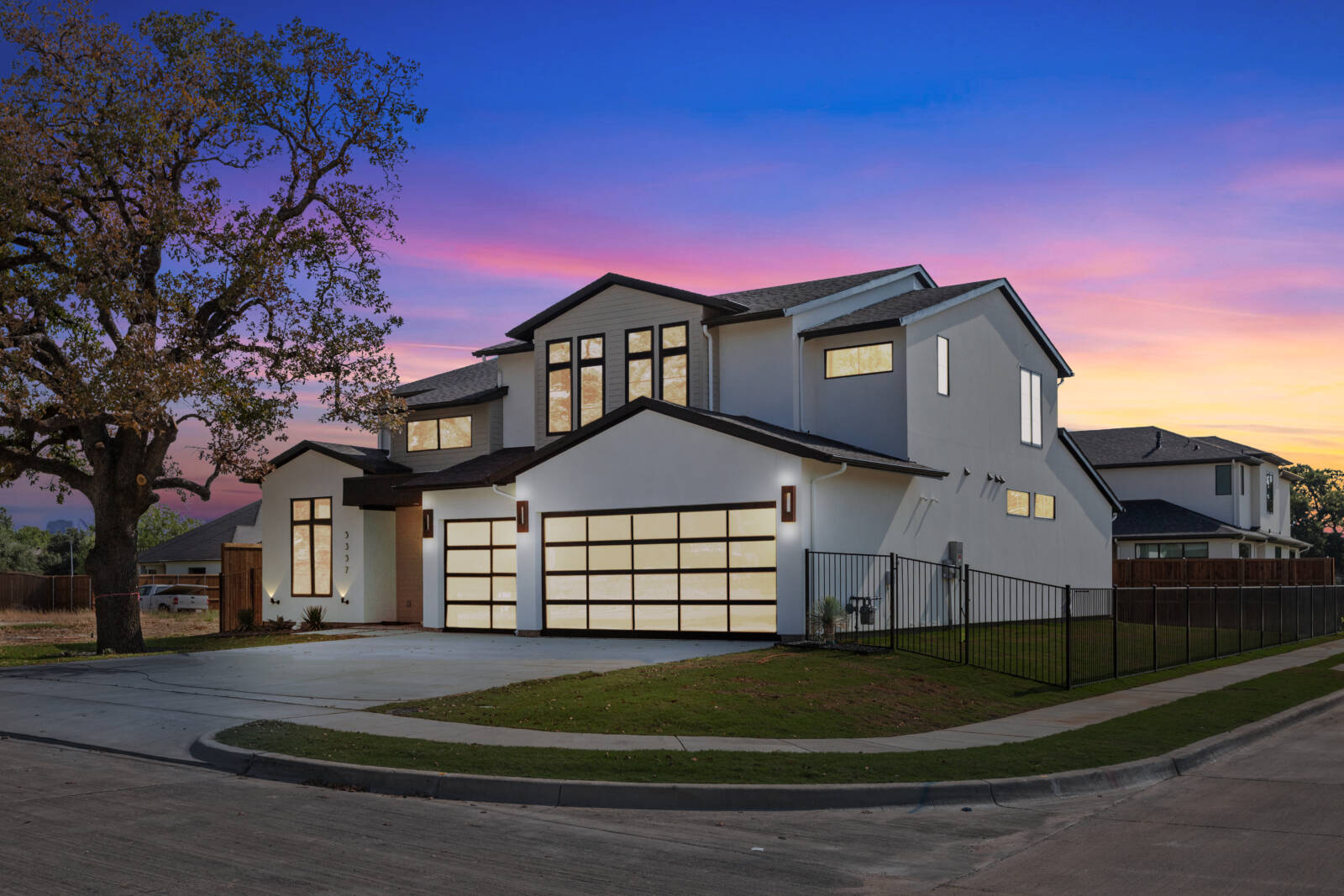 Southlake TX luxury stucco residence at sunset